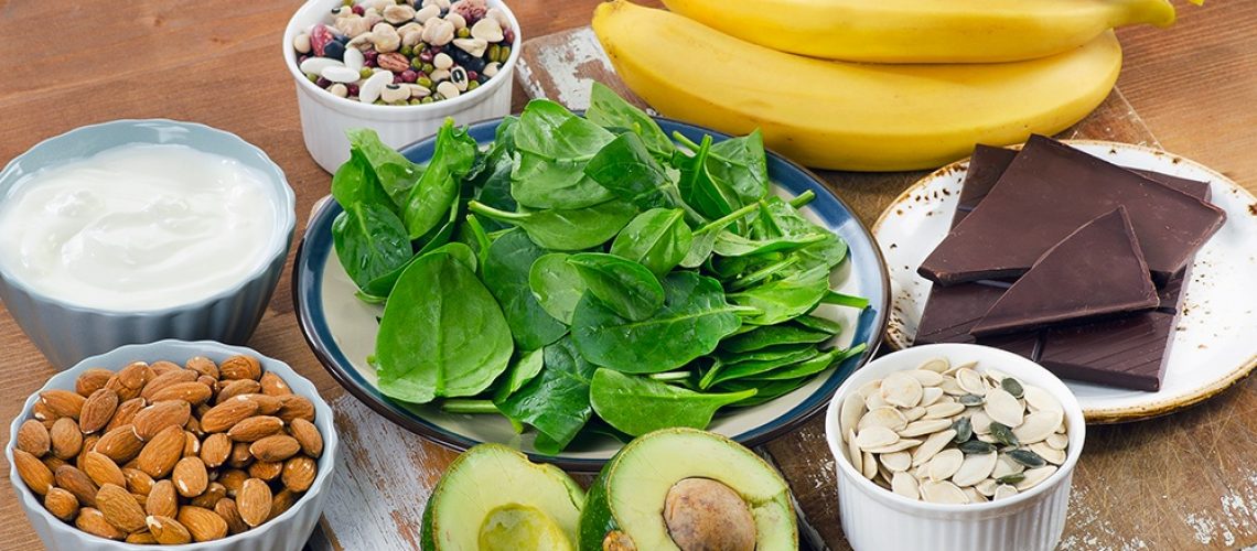 Foods High in Magnesium on a wooden table. Healthy eating.